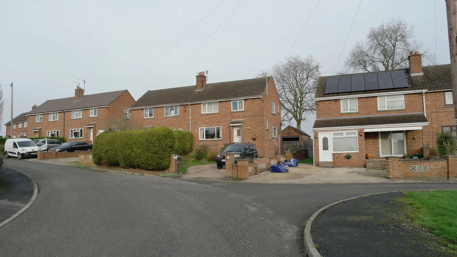A detached house with garden in the United Kingdom, representing residential property ownership.
