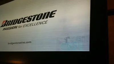 Television screen displaying an advertisement break on a digital display.