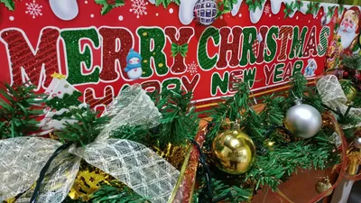 Colourful Christmas decorations and twinkling festive lights creating a warm holiday atmosphere.