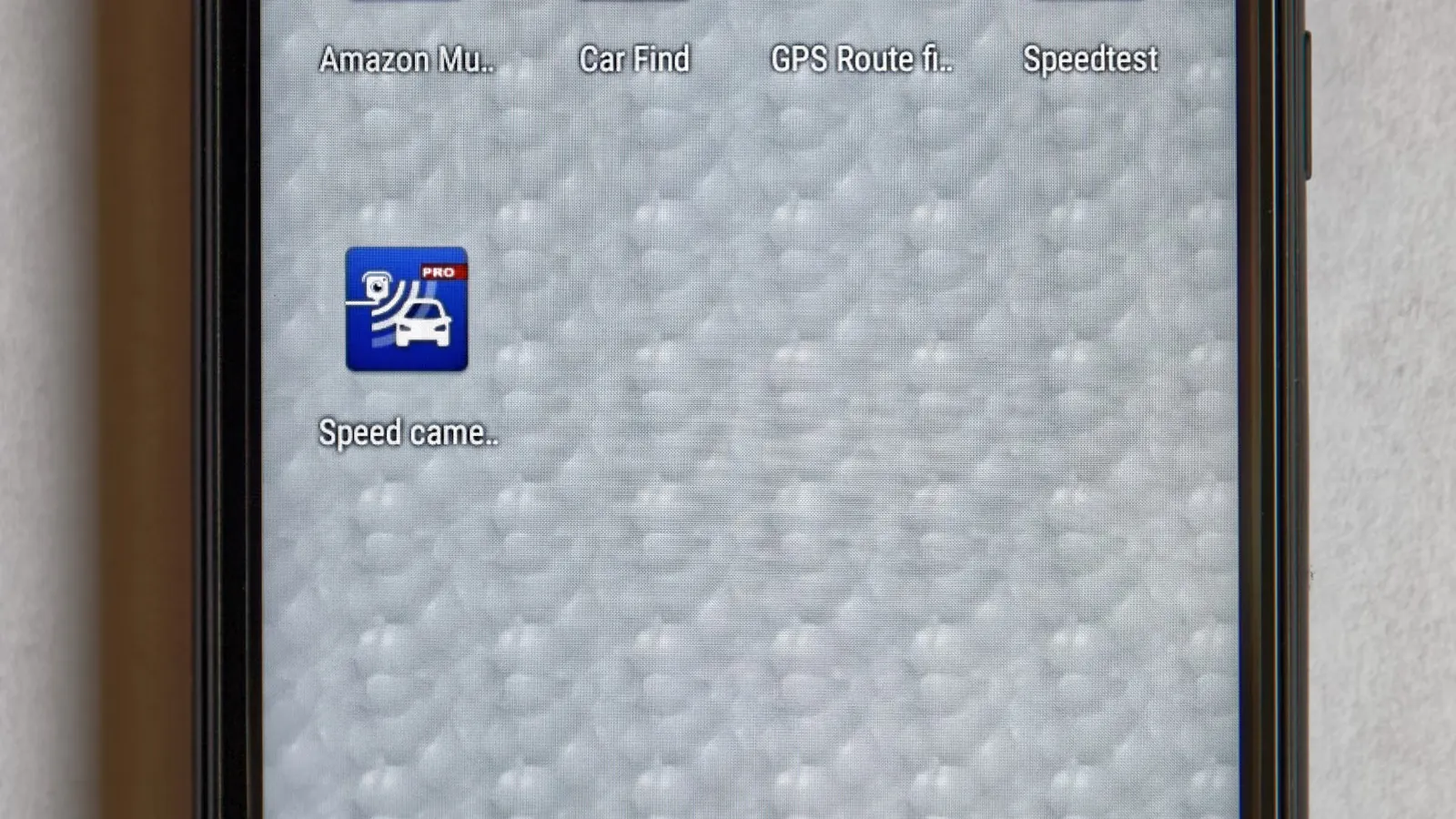 Close-up of a mobile phone screen displaying credit balance information.