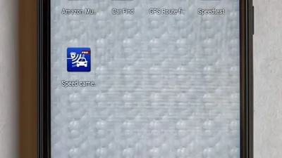 Close-up of a mobile phone screen displaying credit balance information.