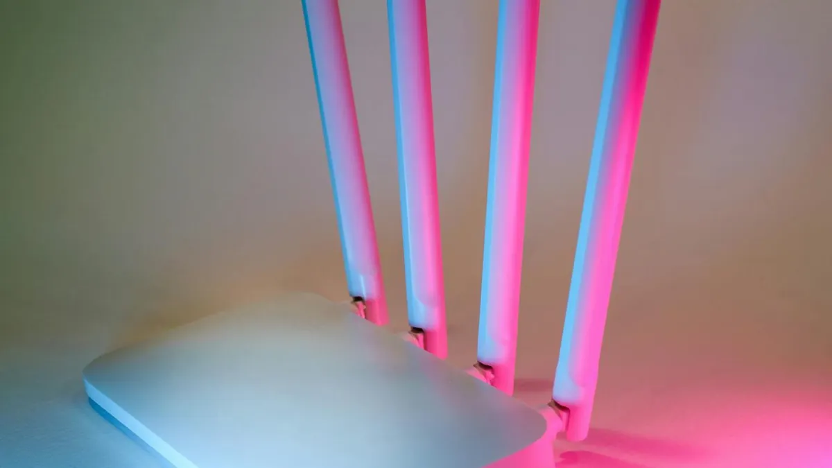 A sleek wireless router enhanced by vibrant neon lights, showcasing cutting-edge technology.