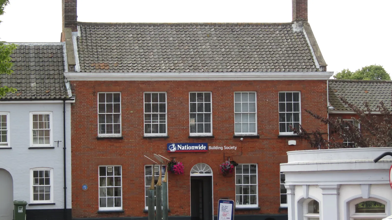Interior of a Nationwide building society branch showing customer service counter and banking facilities