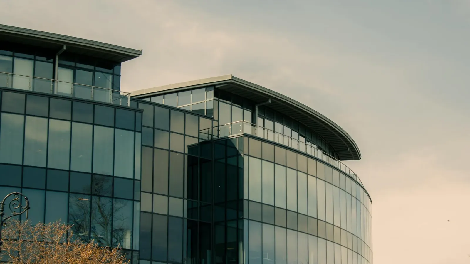A contemporary glass office building in Chester, England showcasing modern architecture.