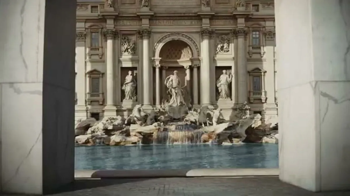 The Trevi Fountain in Rome, Italy, with its ornate sculptures and flowing water, framed by two marble pillars.