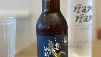A bottle of Birra Moretti lager beer with its distinctive label, representing the Italian brewing brand.